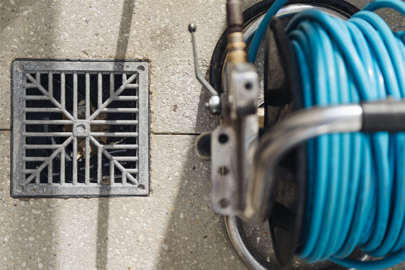An image of some pipes and a drain